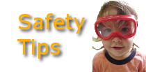 Picture of a child in safety goggles representing the safety tips section